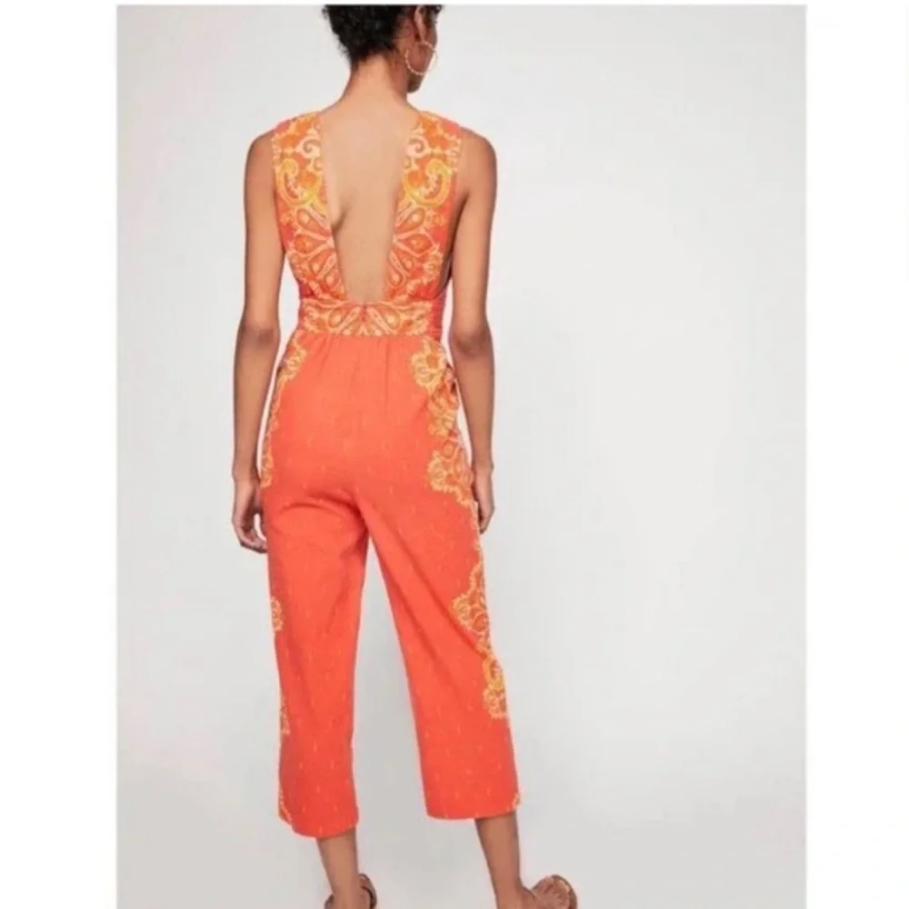 Free People’s Setting Sun Printed Orange Cropped Jumpsuit NWOT - Picture 5 of 12